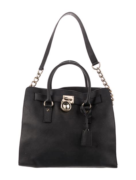 lant michael kors|Michael Kors leather tote.